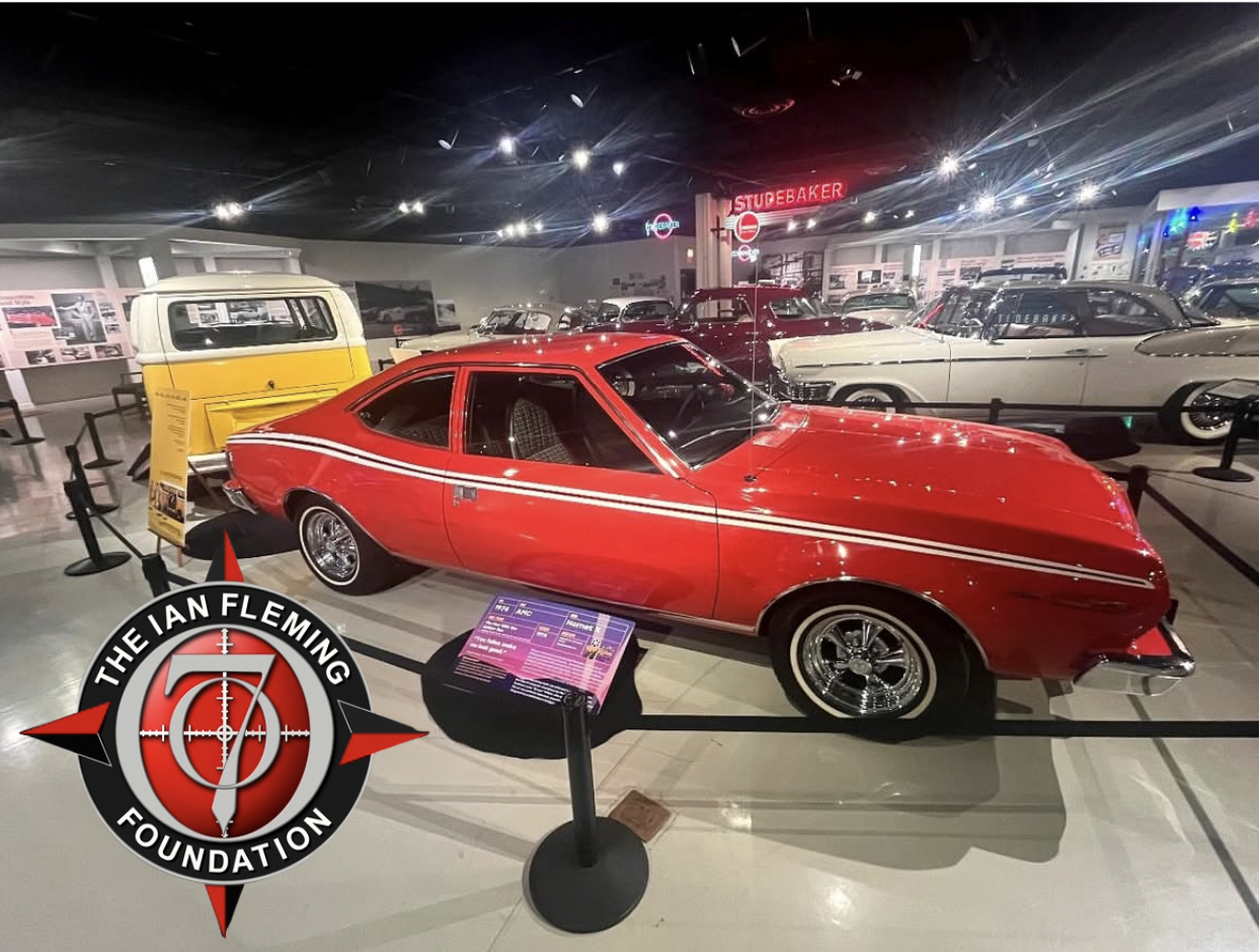 1974 AMC Hornet X used in The Man with the Golden Gun. The car is red with white stripes.
